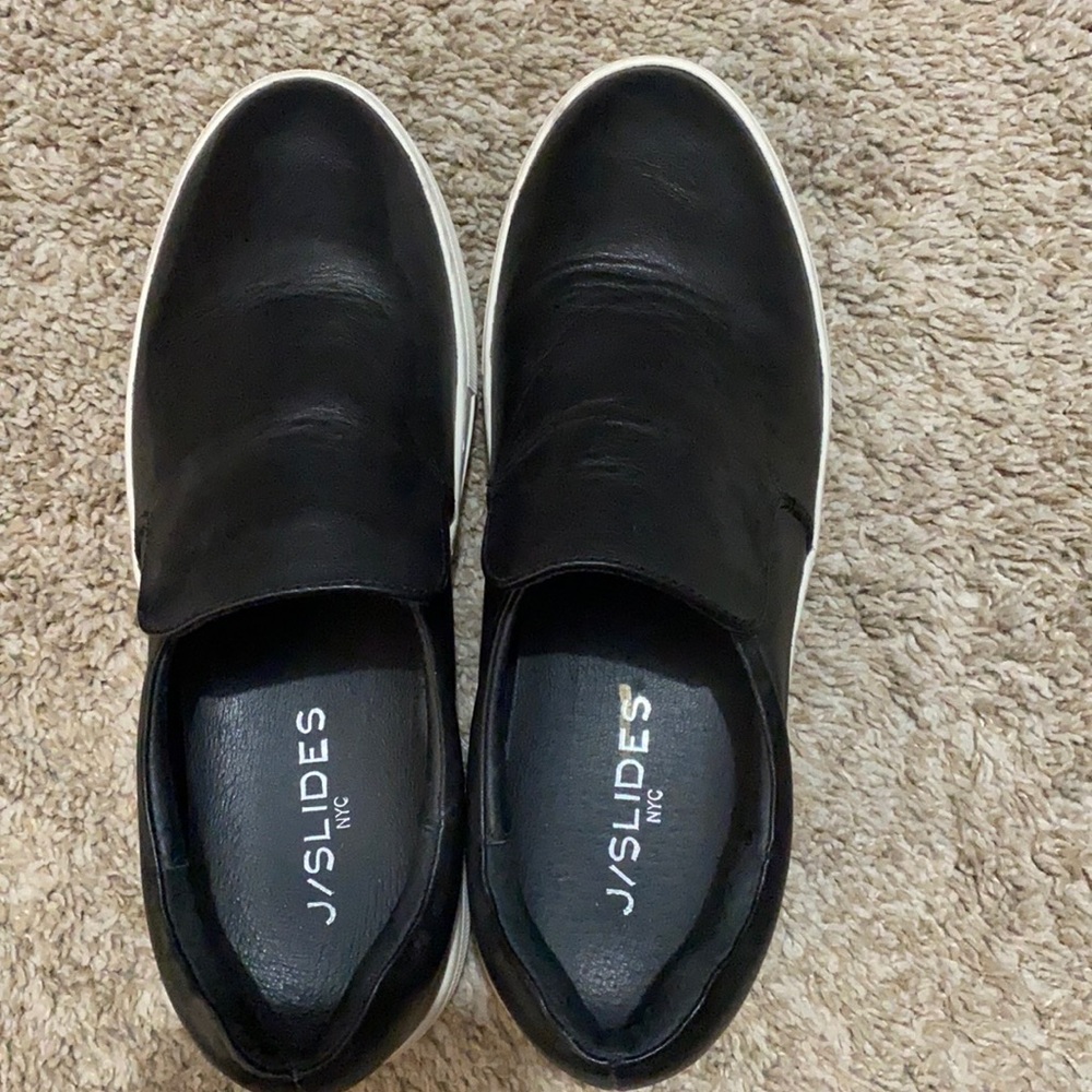 Black leather slip on sneakers